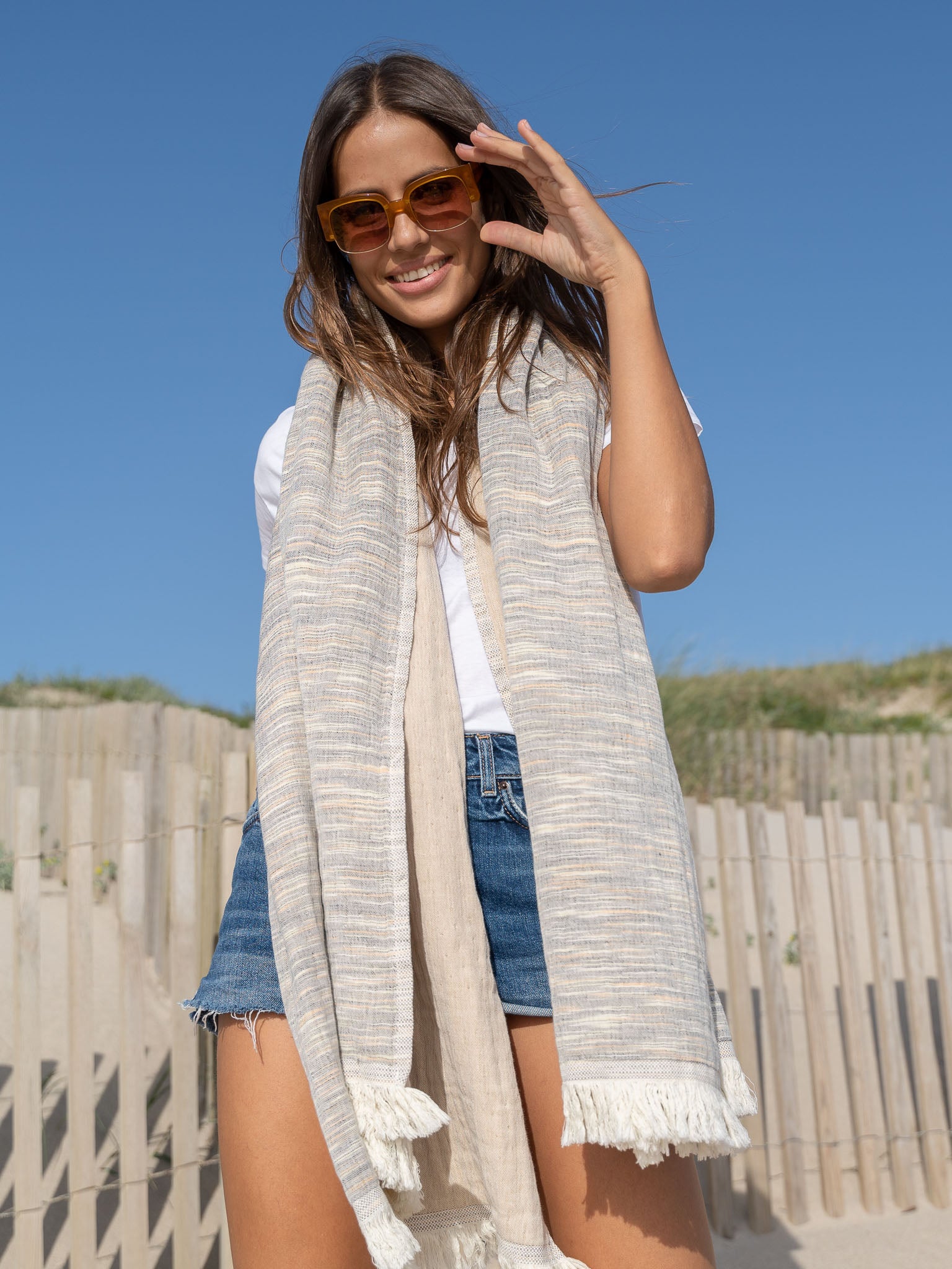 Girl with Brown patterned beach towel
