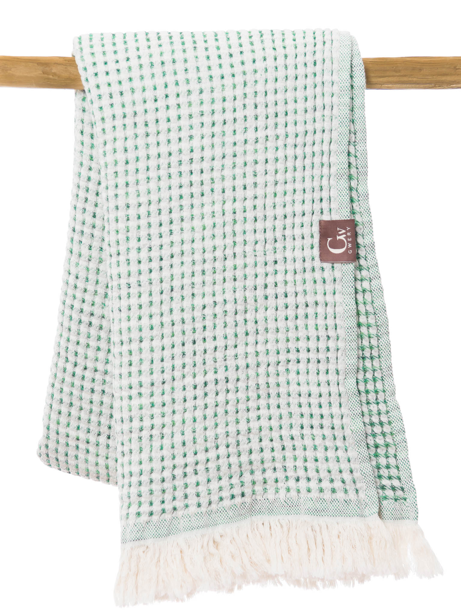Green patterned double sided, honeycomb beach towel folded