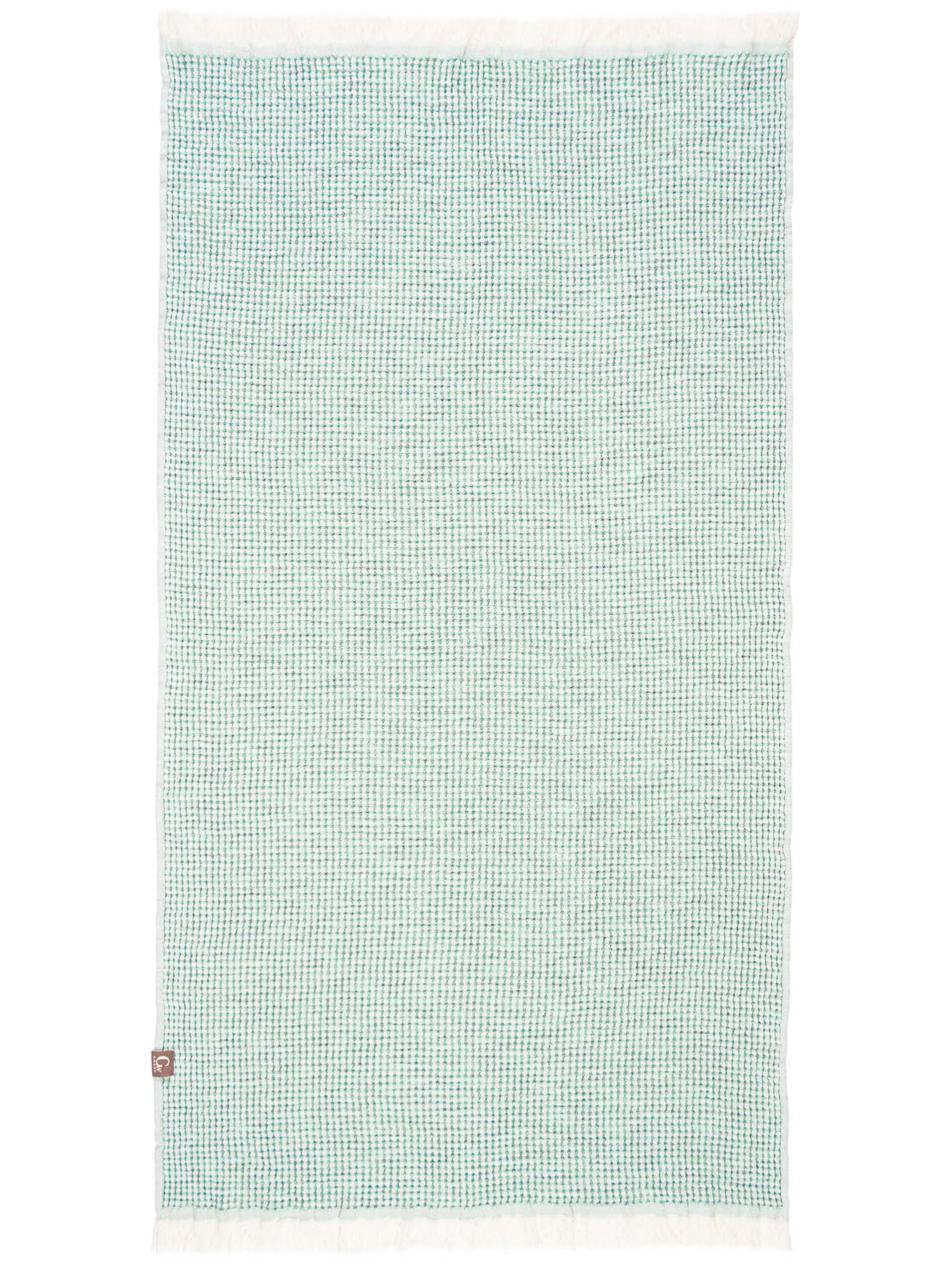 Green patterned double sided, honeycomb beach towel open up