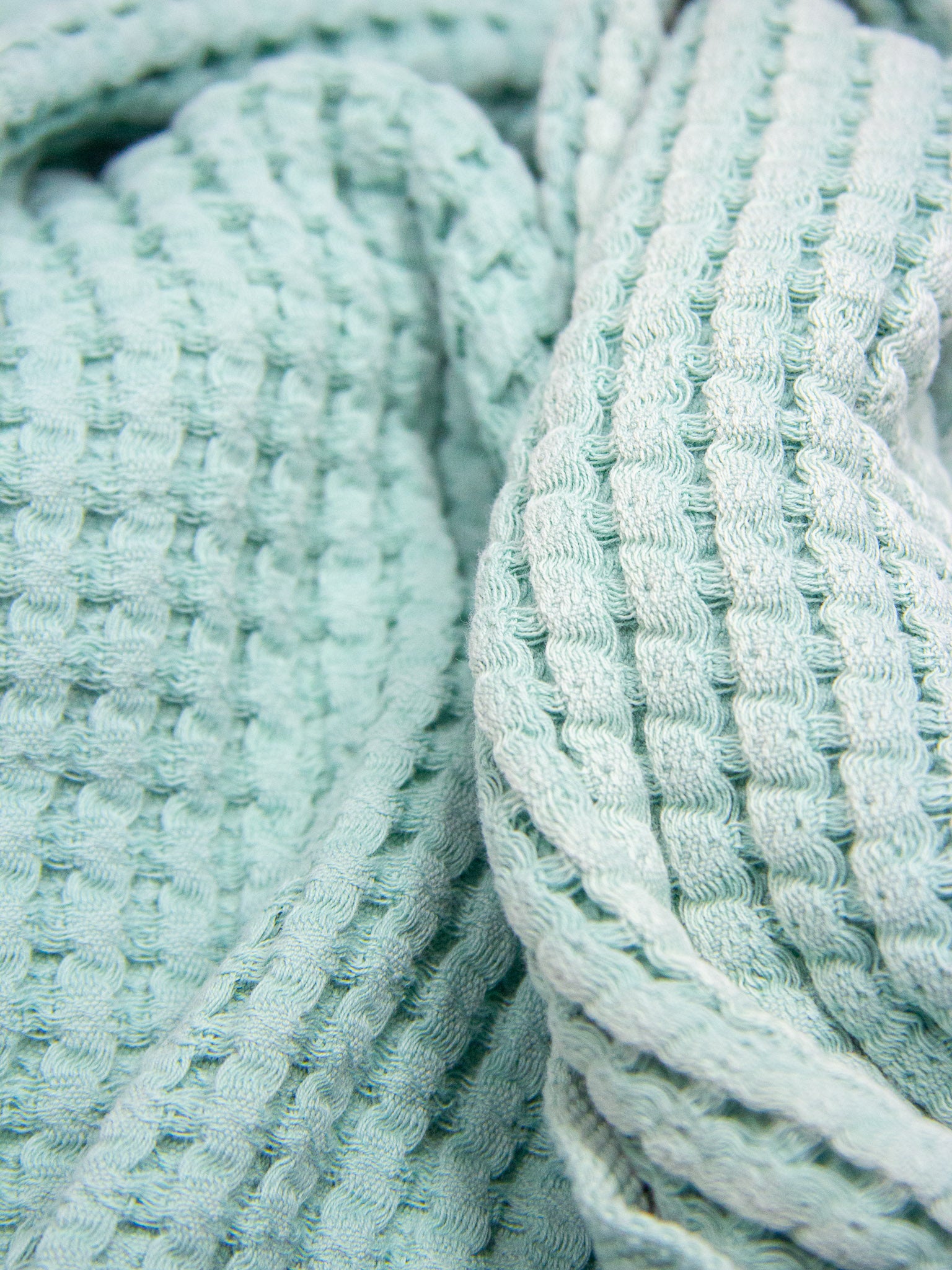 Cyan double sided honeycomb beach towel close up