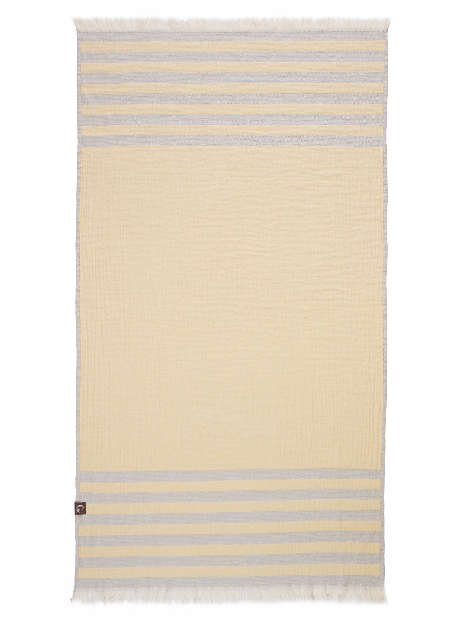 Blue and yellow striped beach towel open up showing yellow side