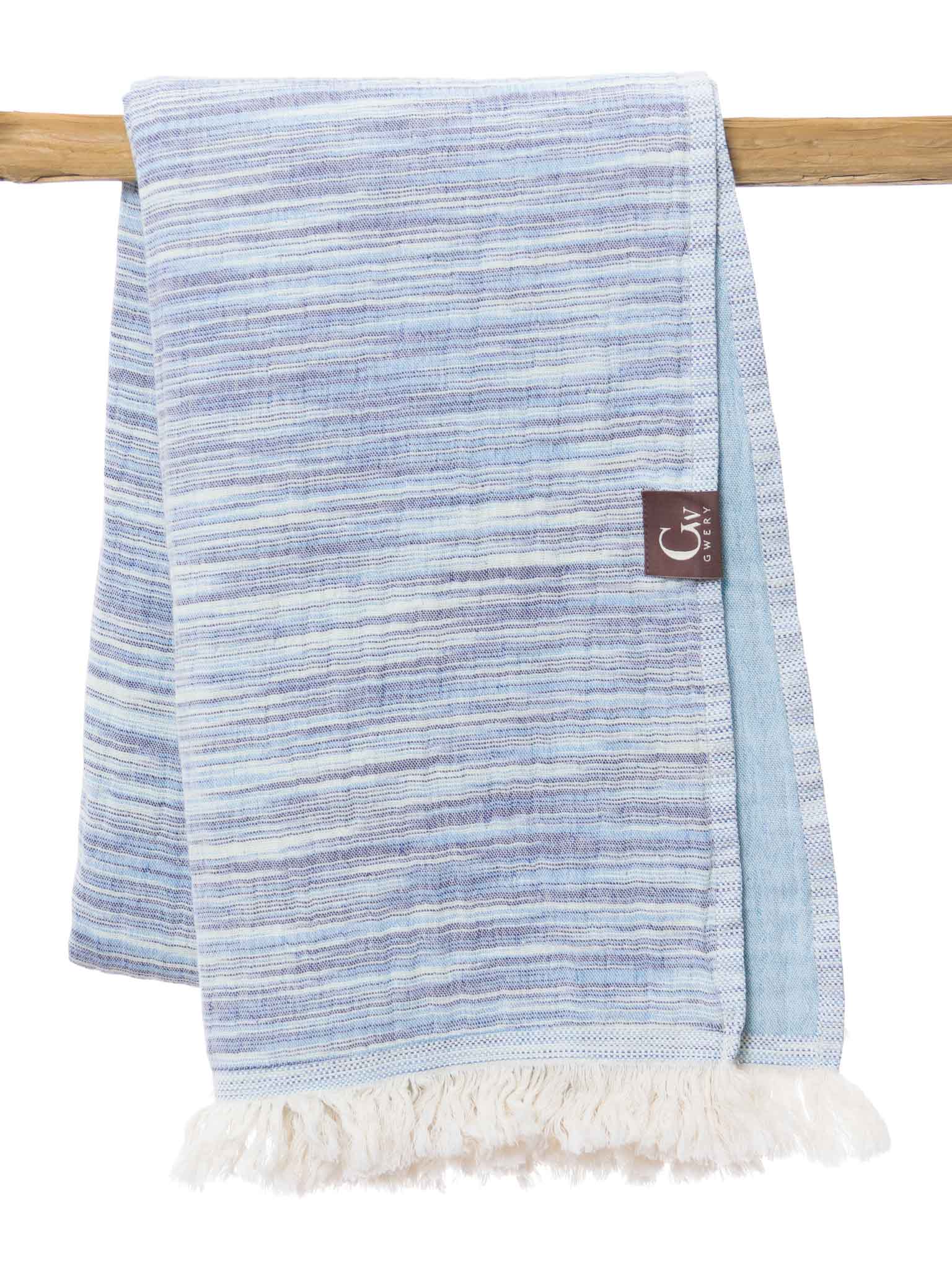 Blue patterned double sided beach towel folded