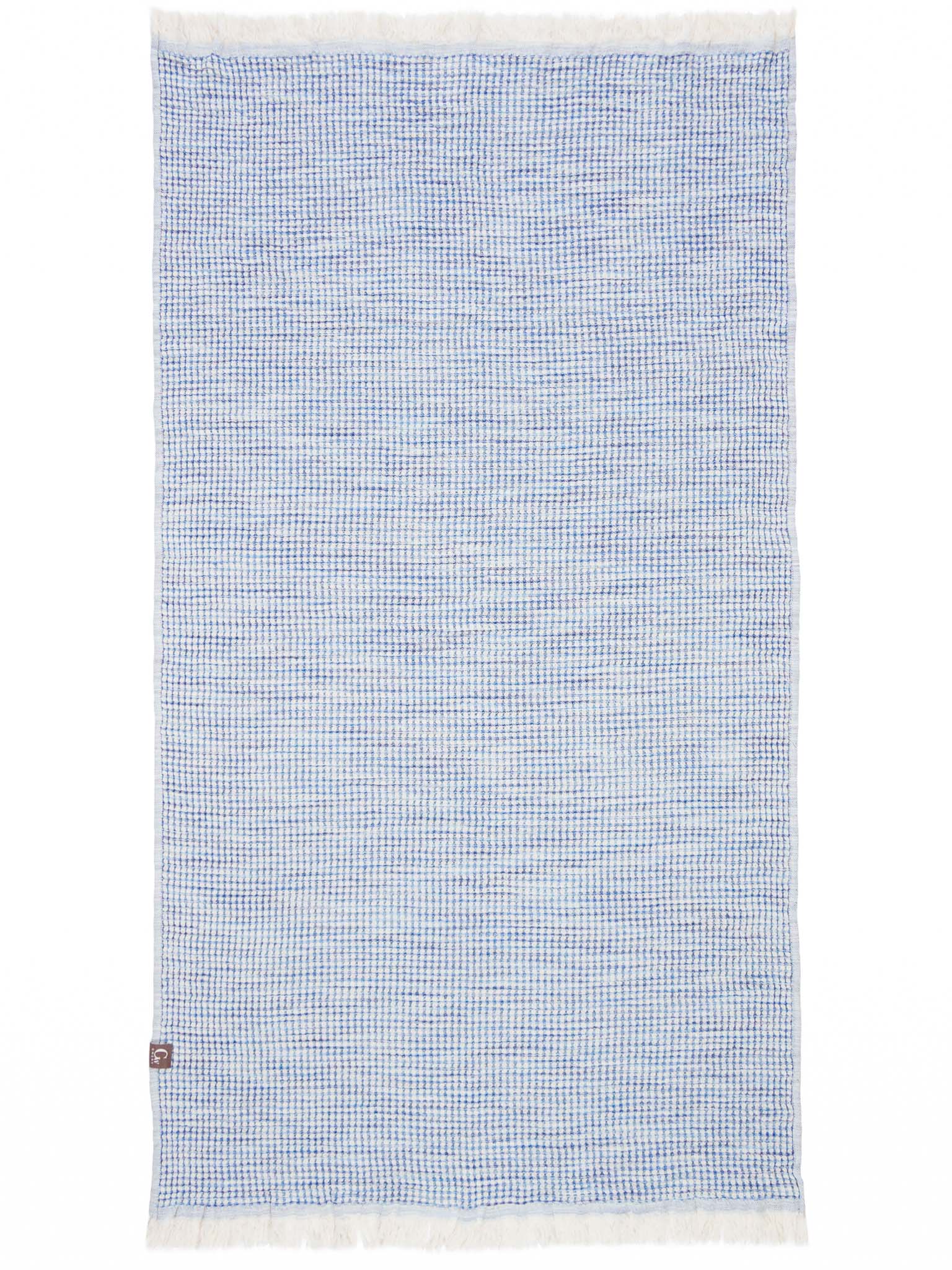 Blue patterned, double sided, honeycomb beach towel open up