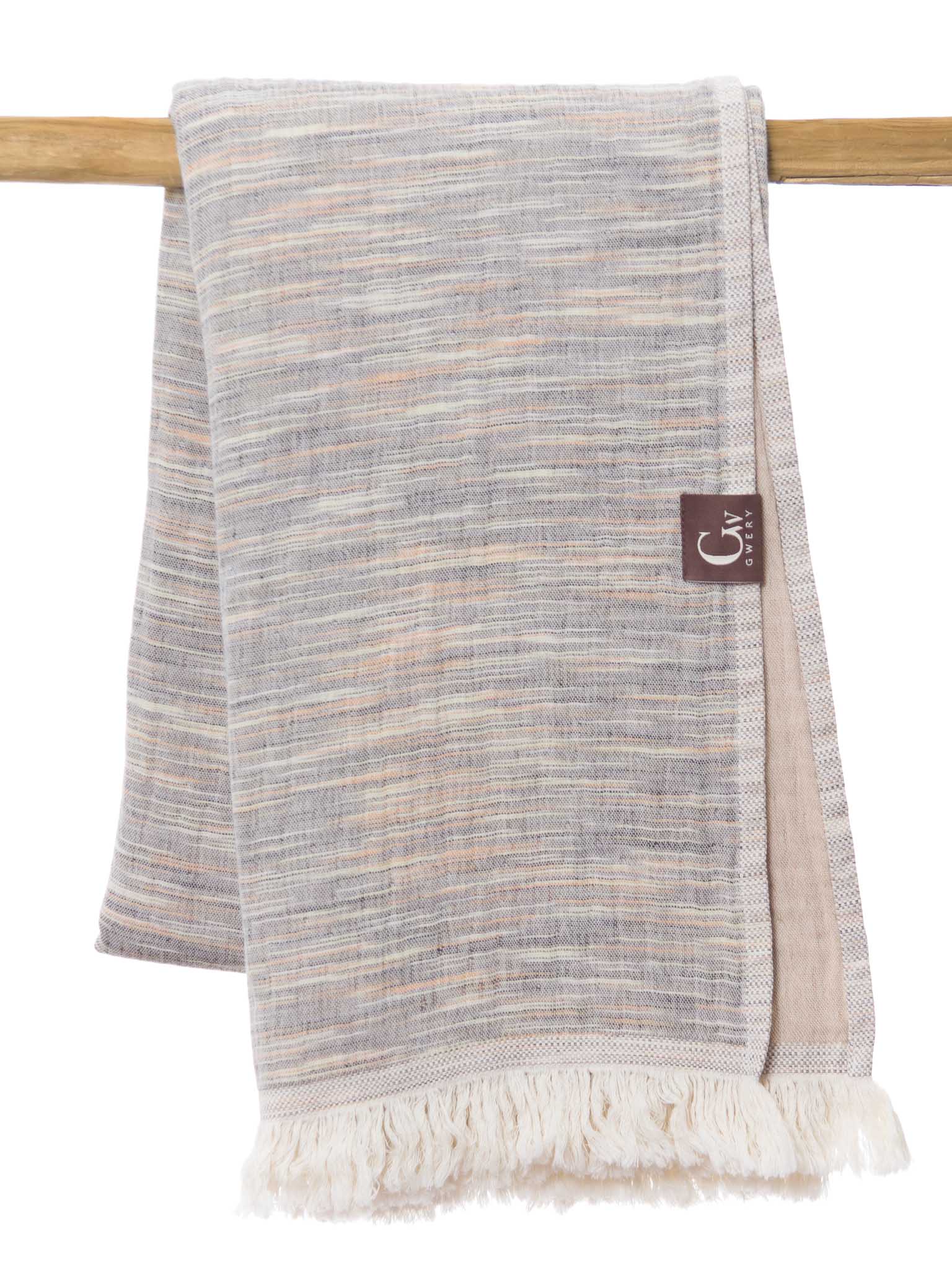 Brown patterned, double sided, beach towel folded
