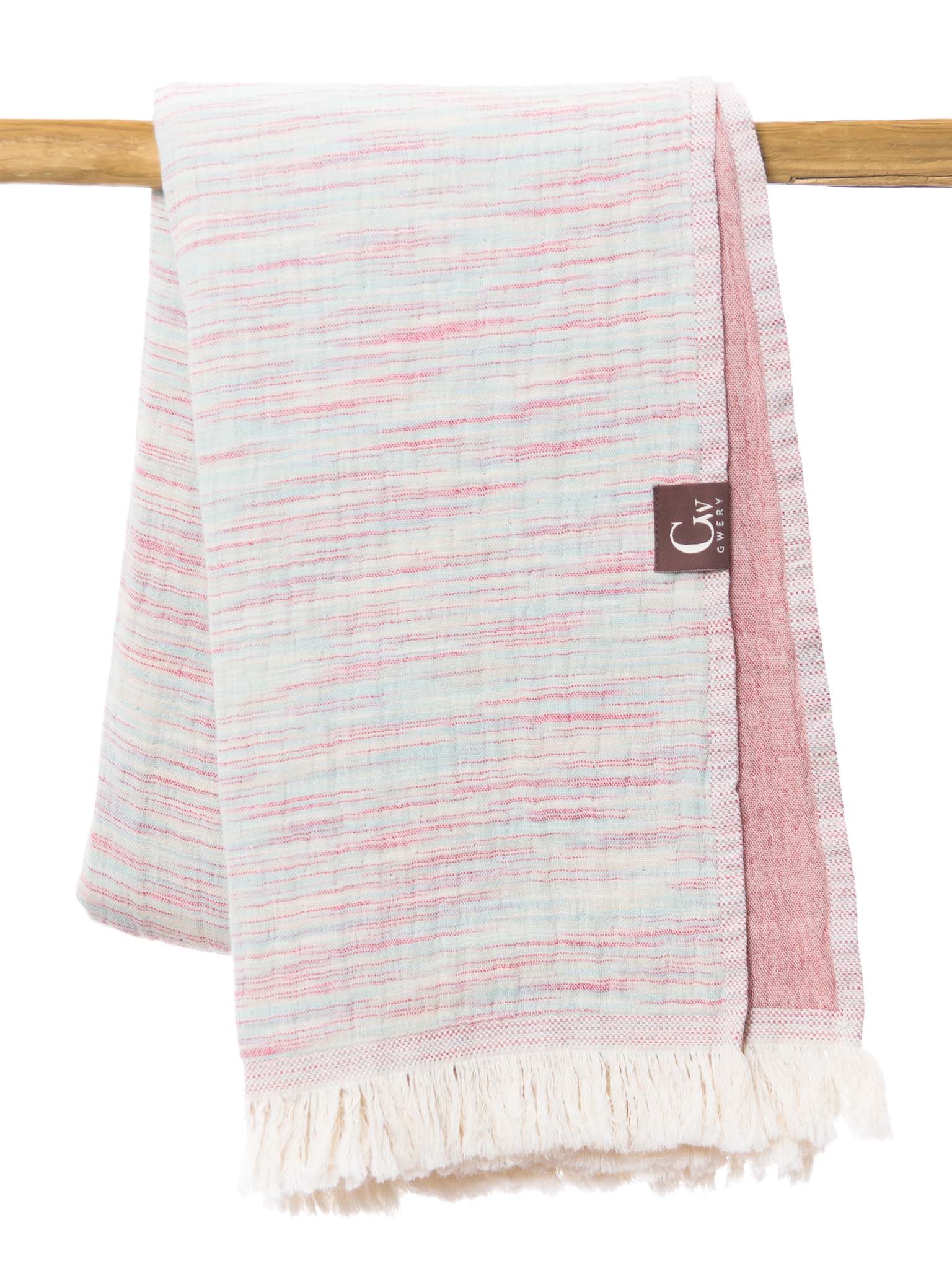 Pink patterned, double sided, beach towel folded