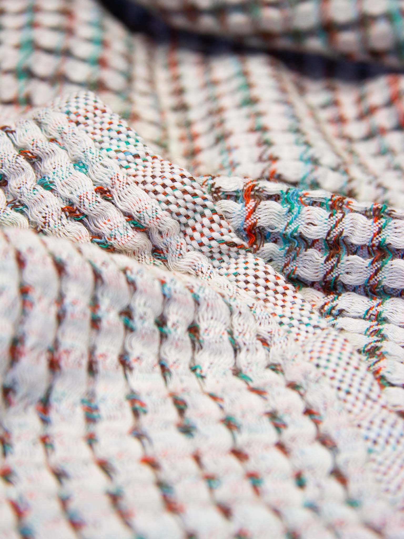 Multicolored double sided, honeycomb beach towel close up