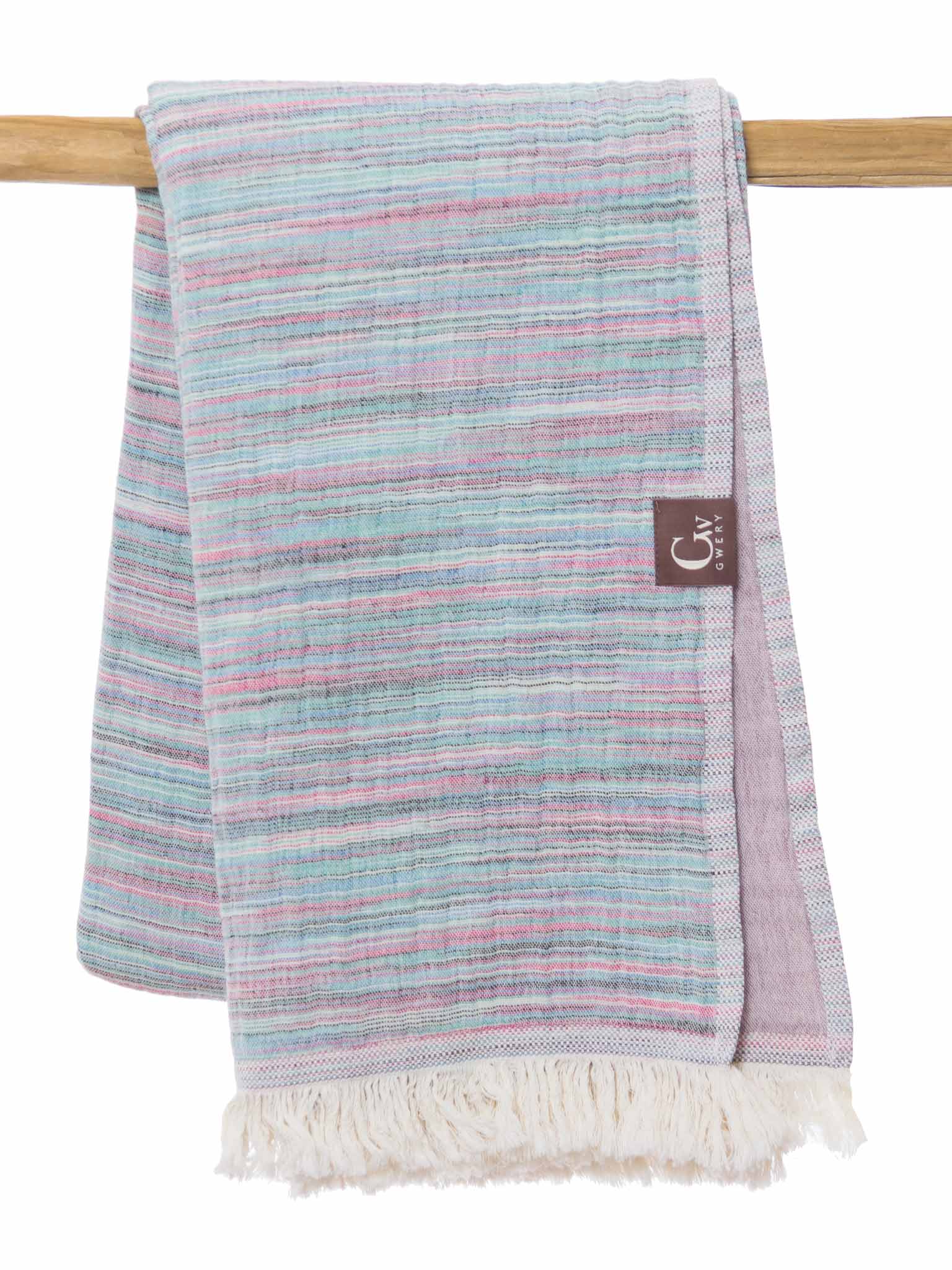 Purple patterned, double sided, beach towel folded