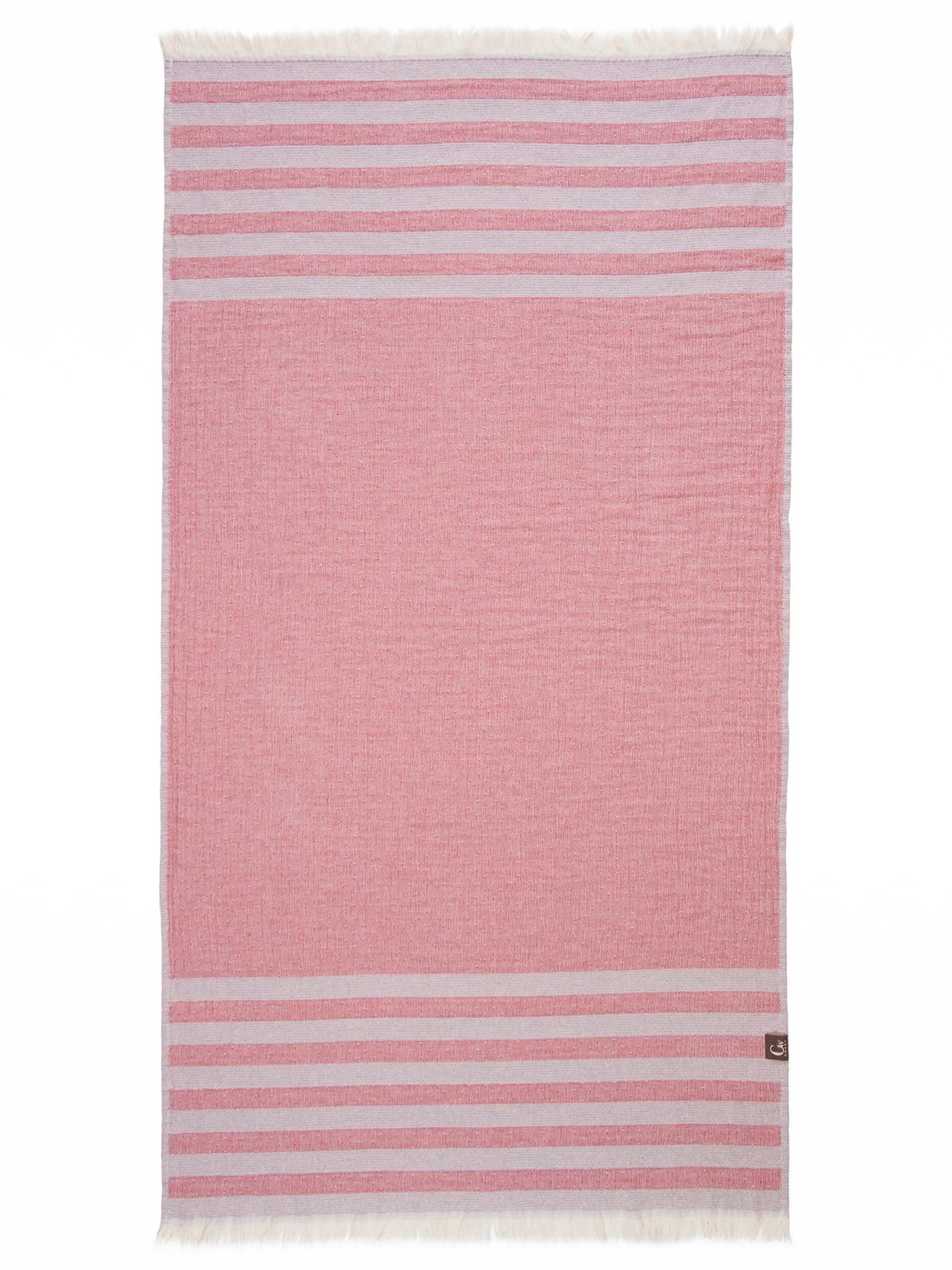 Red and blue double sided striped beach towel open up showing red side