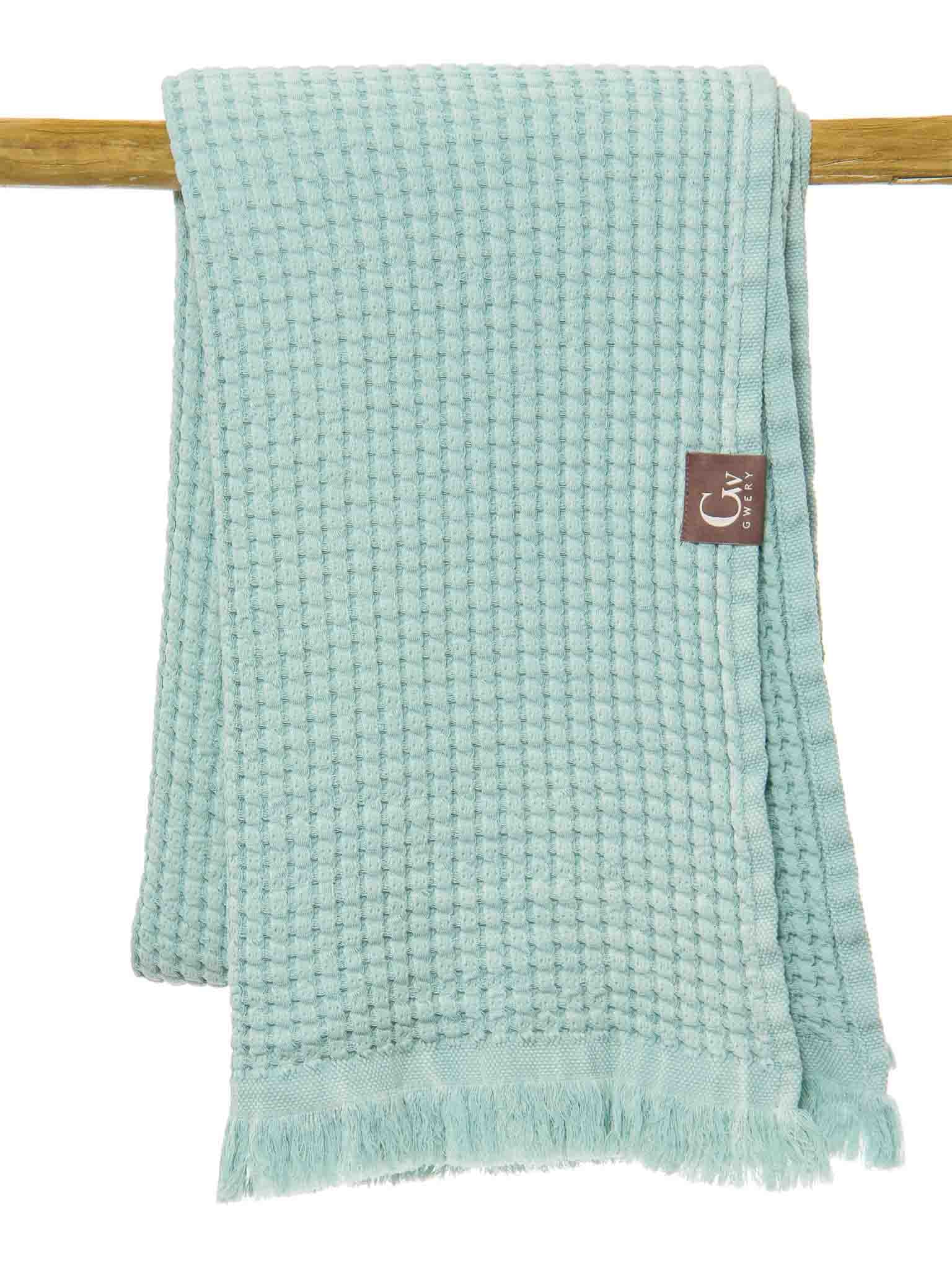 Cyan double sided honeycomb beach towel folded